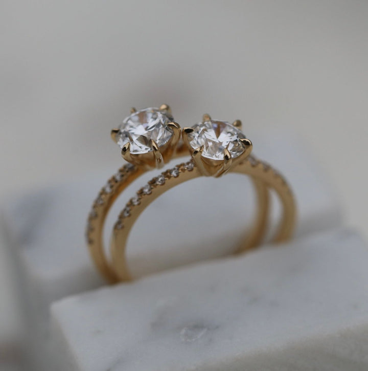 Close-up of round cut center diamond in solitaire engagement ring