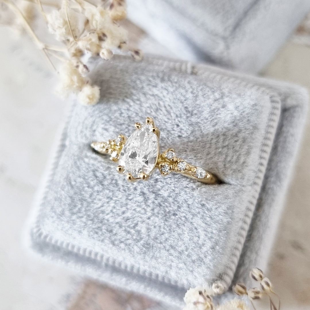 Shop the pear cut pave engagement ring collection online