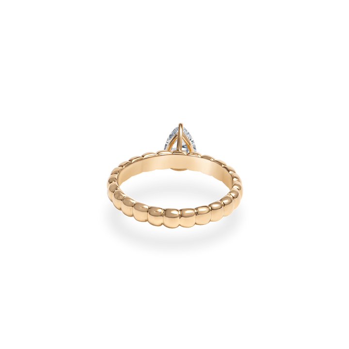 Side angle of pear solitaire diamond engagement ring