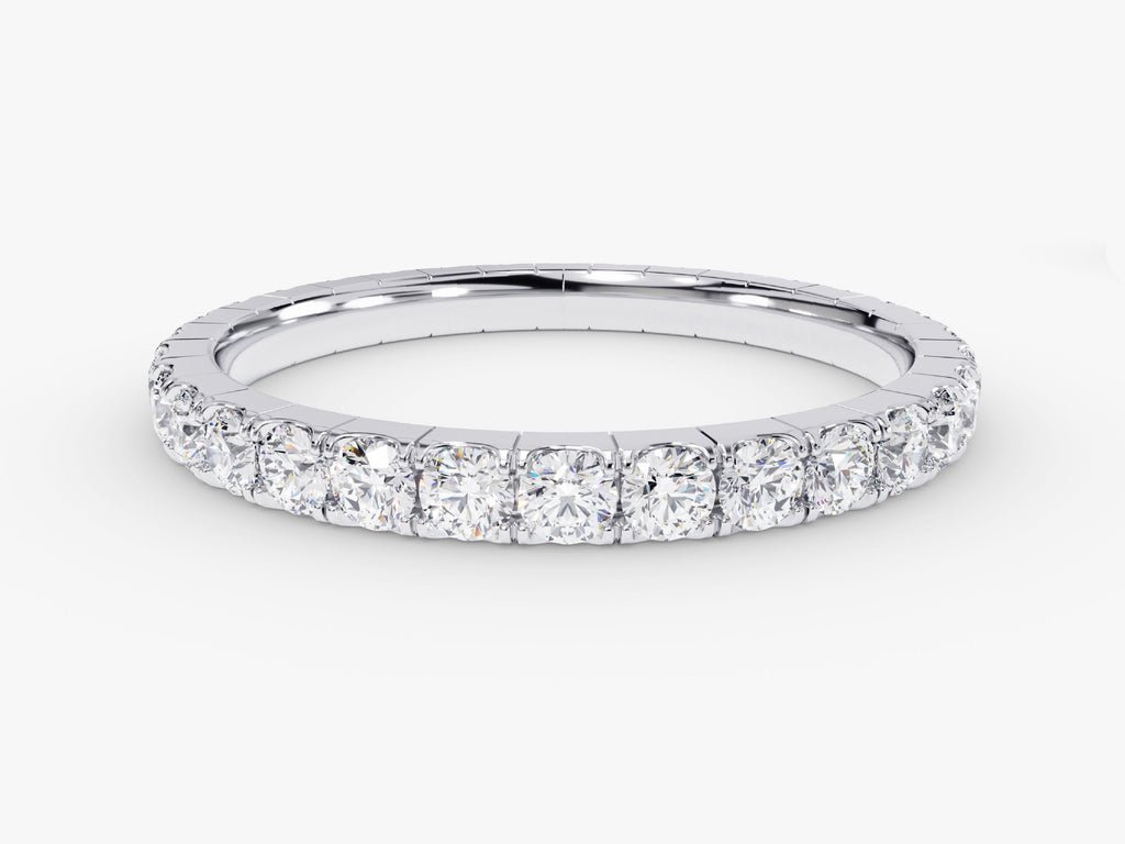 Round diamond band stacked with engagement ring
