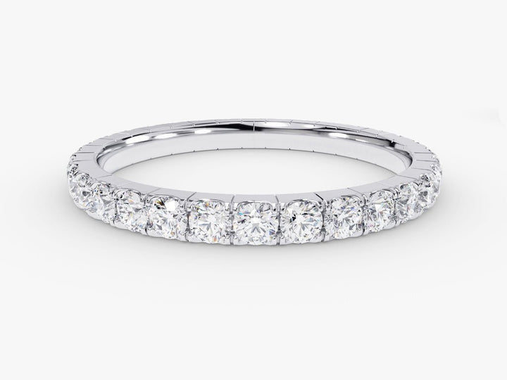 Round diamond band stacked with engagement ring