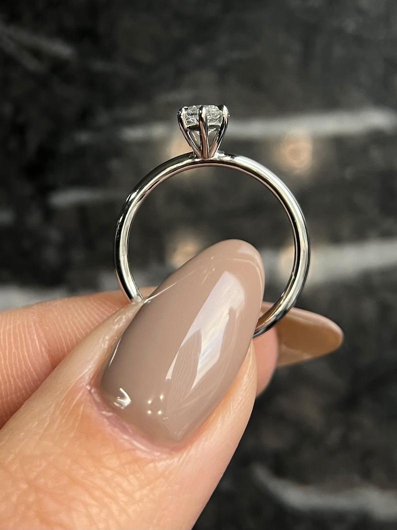 Classic marquise solitaire engagement ring crafted for everyday wear