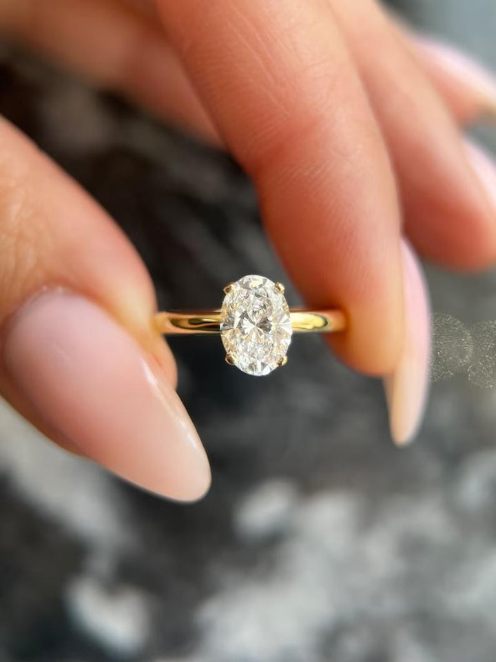 Shop oval hidden halo lab grown diamond engagement ring