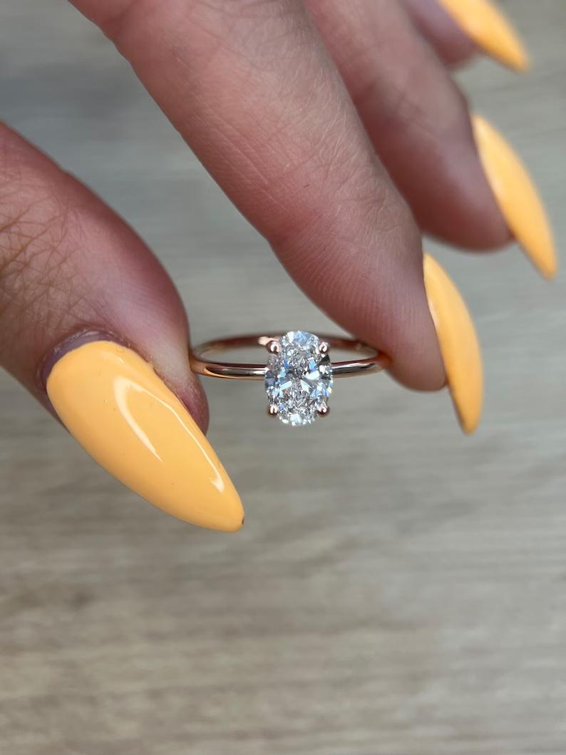 1.0CT oval cut solitaire engagement ring available to buy now