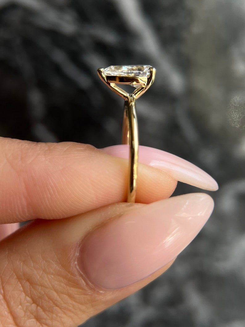 Top-down view of pear cut solitaire engagement ring