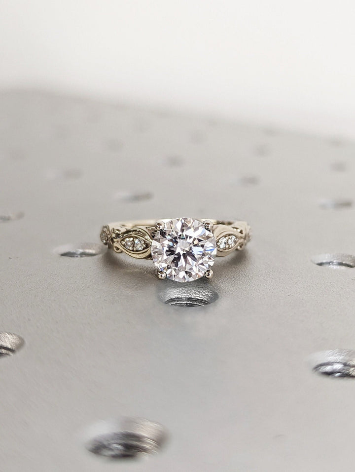 Round vintage lab grown diamond ring side profile in gold setting