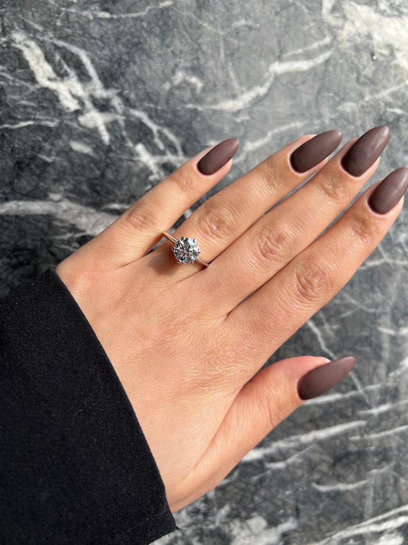 Top-down view of round cut solitaire engagement ring