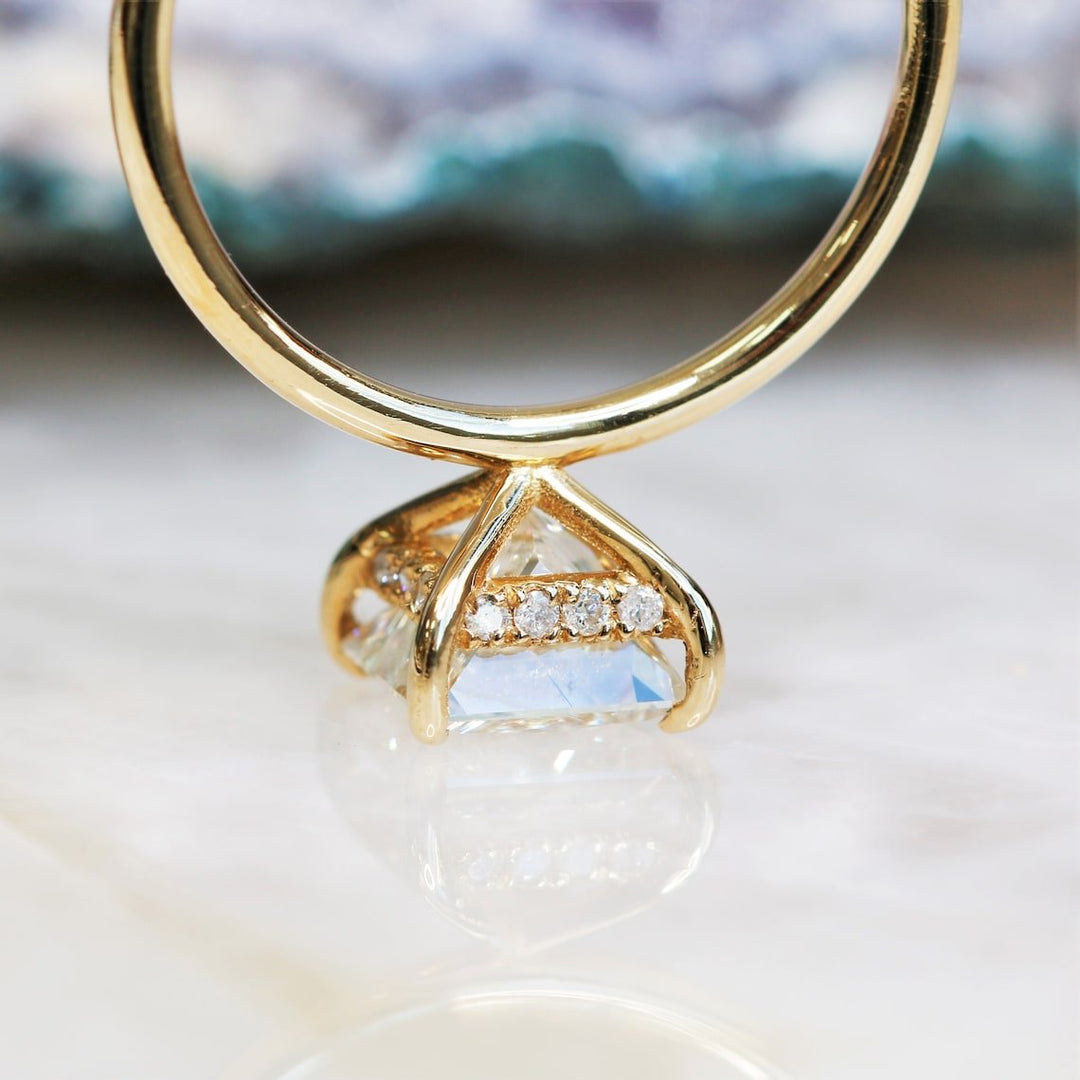 Certified princess cut diamond featured in hidden halo engagement ring