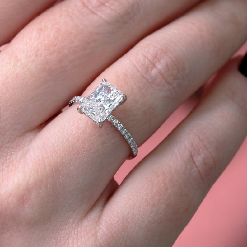 Radiant cut engagement ring side view showing band detail
