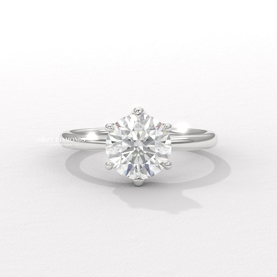 Unboxing view of round cut solitaire diamond engagement ring