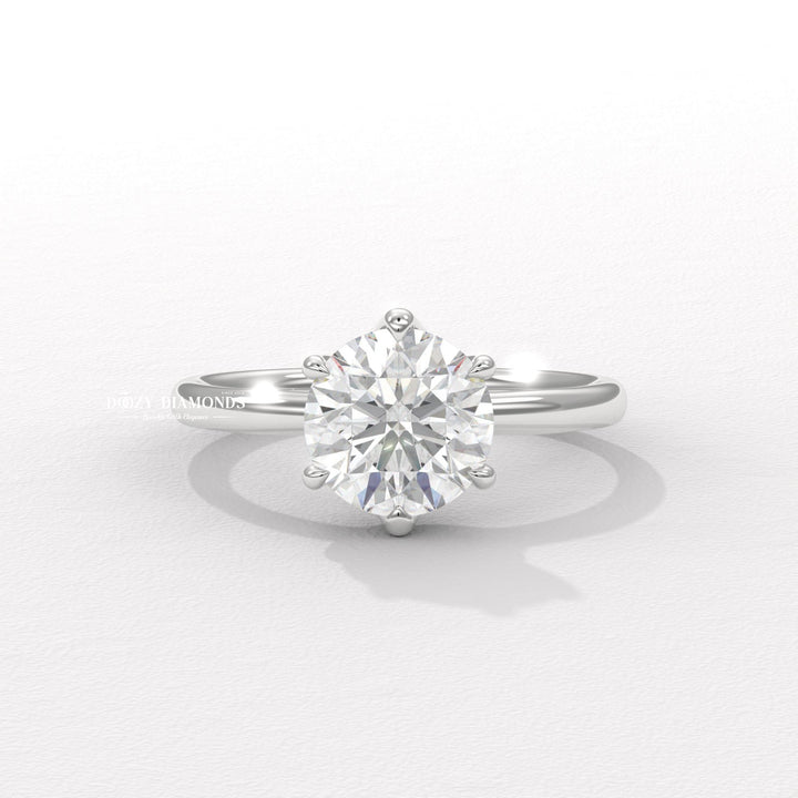 Unboxing view of round cut solitaire diamond engagement ring