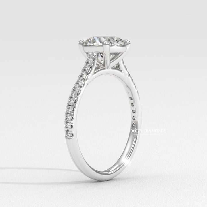 Round cut engagement ring shown with authenticity certificate