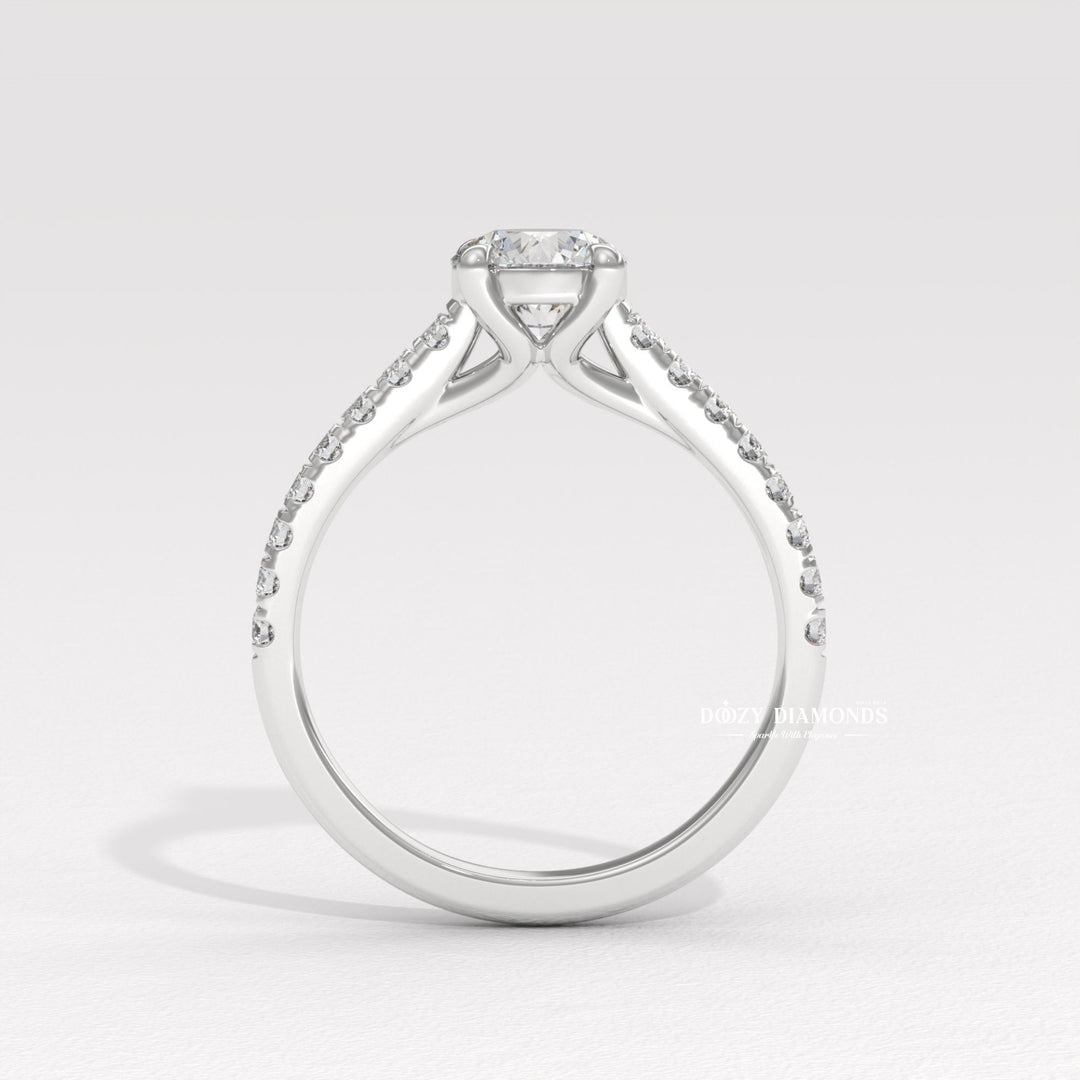 Round solitaire engagement ring photographed in natural light