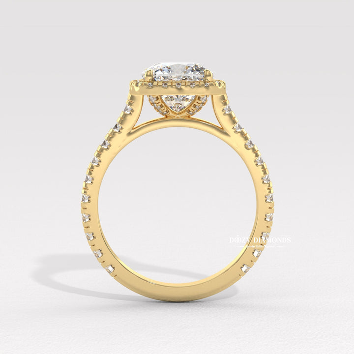 Cushion halo diamond ring displayed on jewelry stand