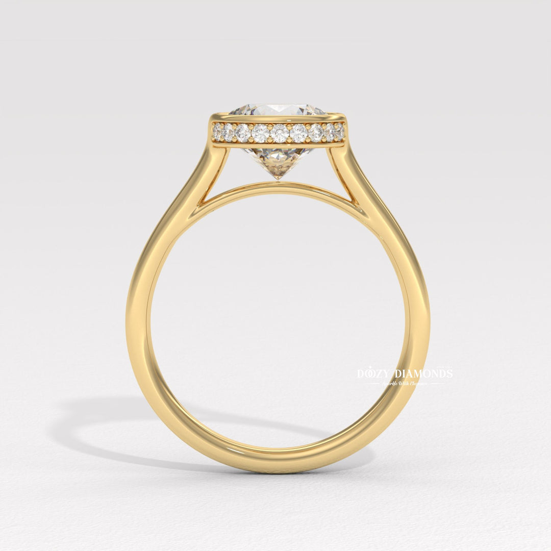 Round hidden halo engagement ring offered in gold and platinum