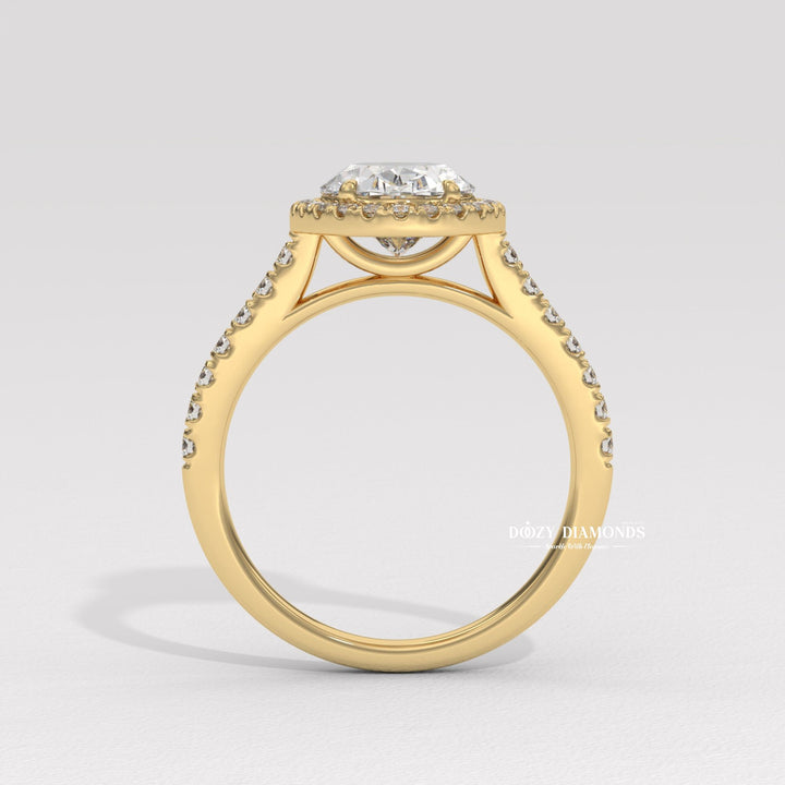 Oval cut halo engagement ring shown in real-life wear