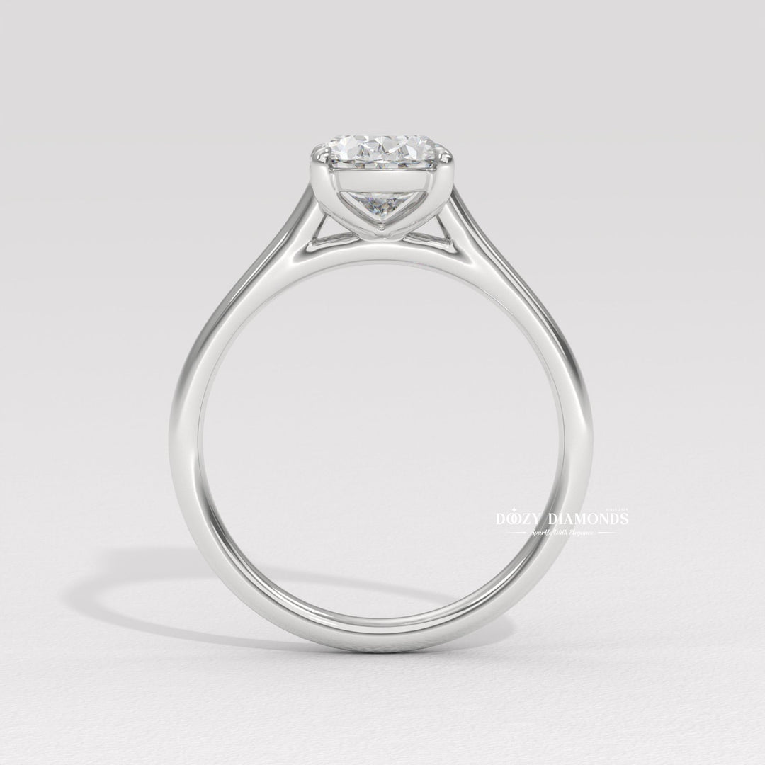 Oval cut solitaire engagement ring shown in real-life wear