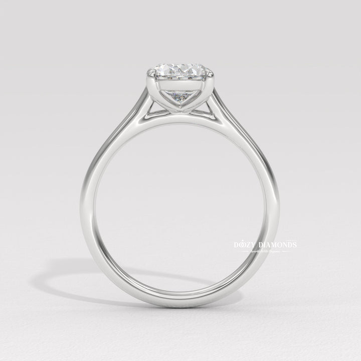 Oval cut solitaire engagement ring shown in real-life wear