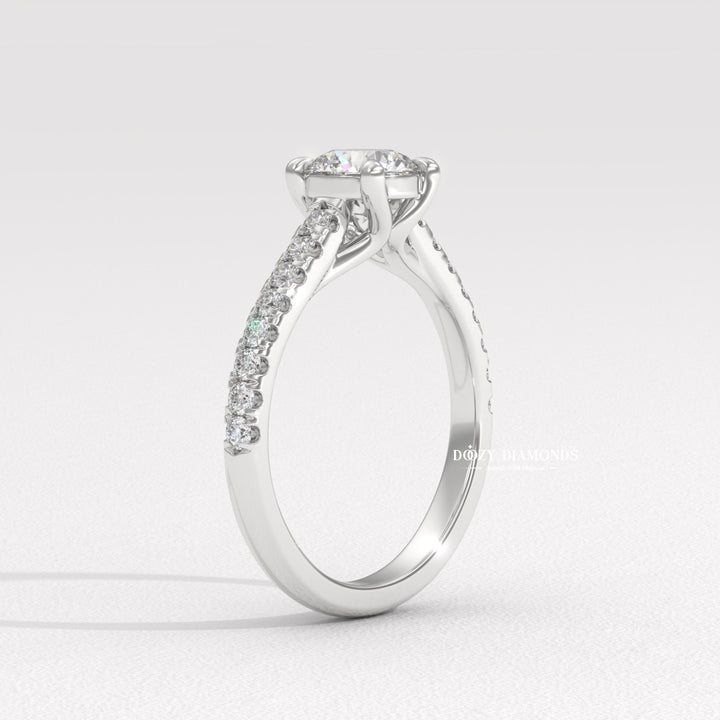 Round solitaire engagement ring finished in polished solid gold