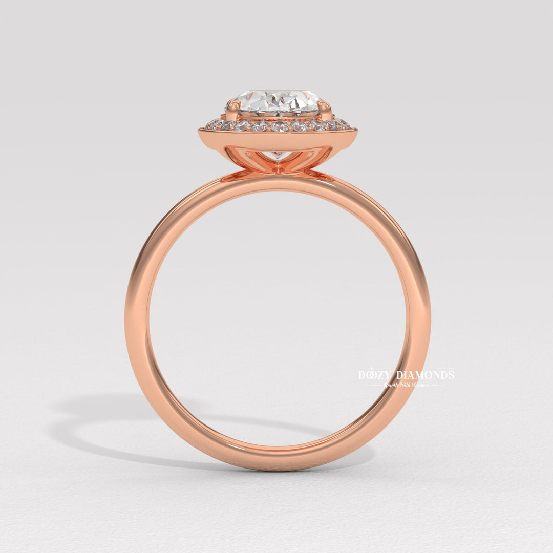 Oval halo diamond engagement ring available in multiple metals