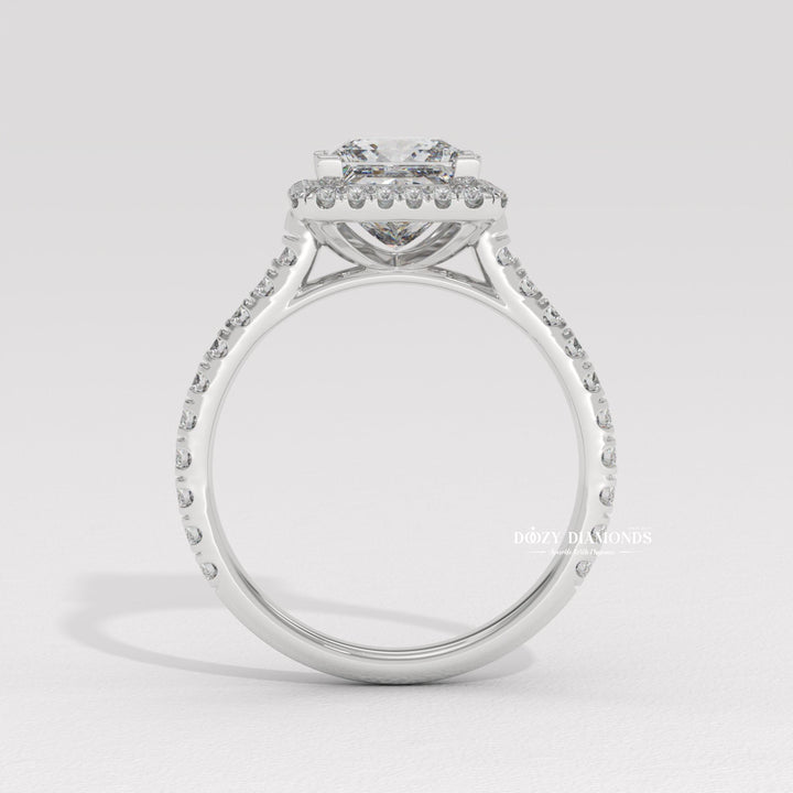 Princess halo engagement ring offered in gold and platinum