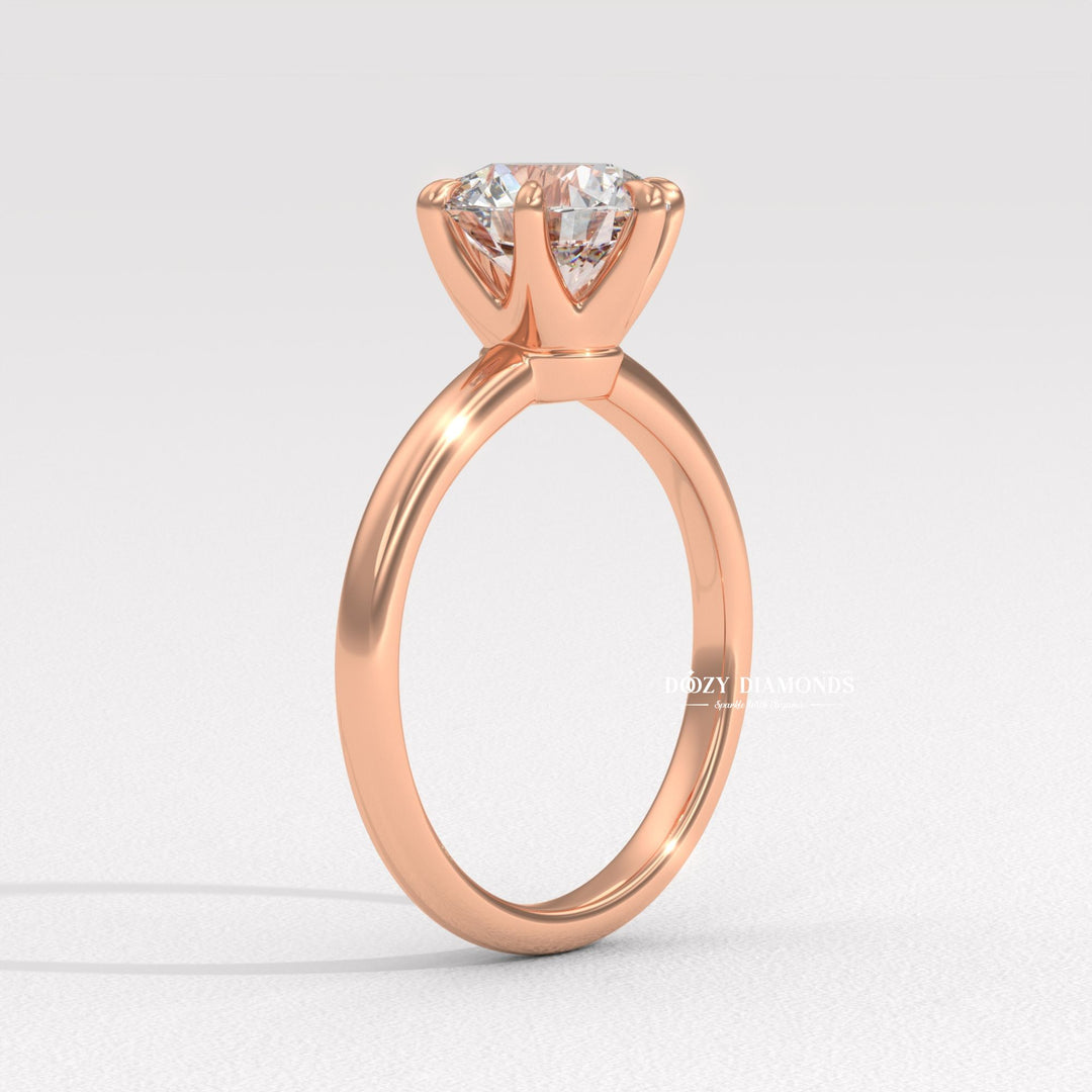 Round cut engagement ring side view showing band detail