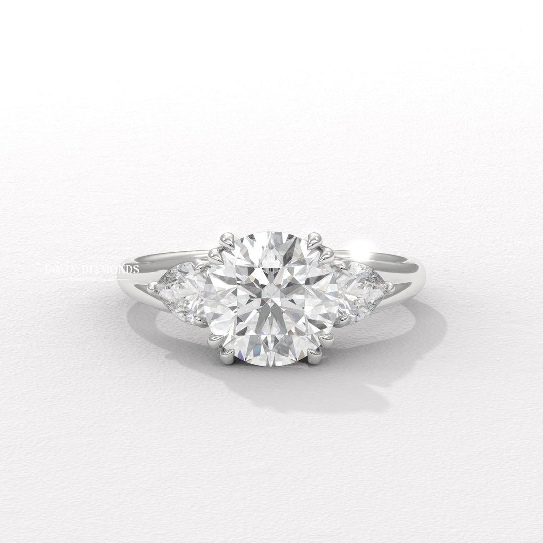 Side angle of round three stone diamond engagement ring