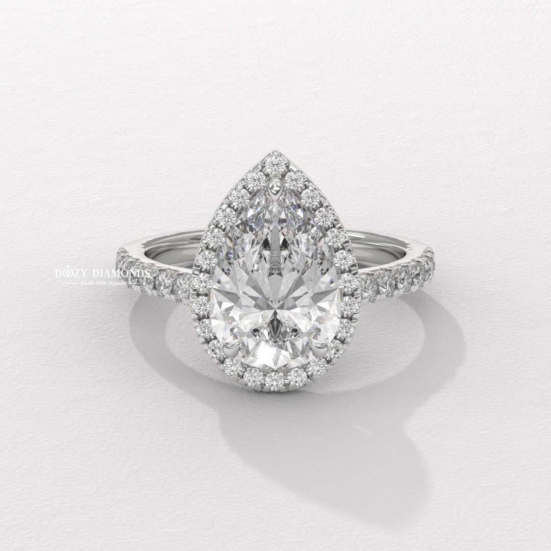 Pear cut engagement ring side view showing band detail