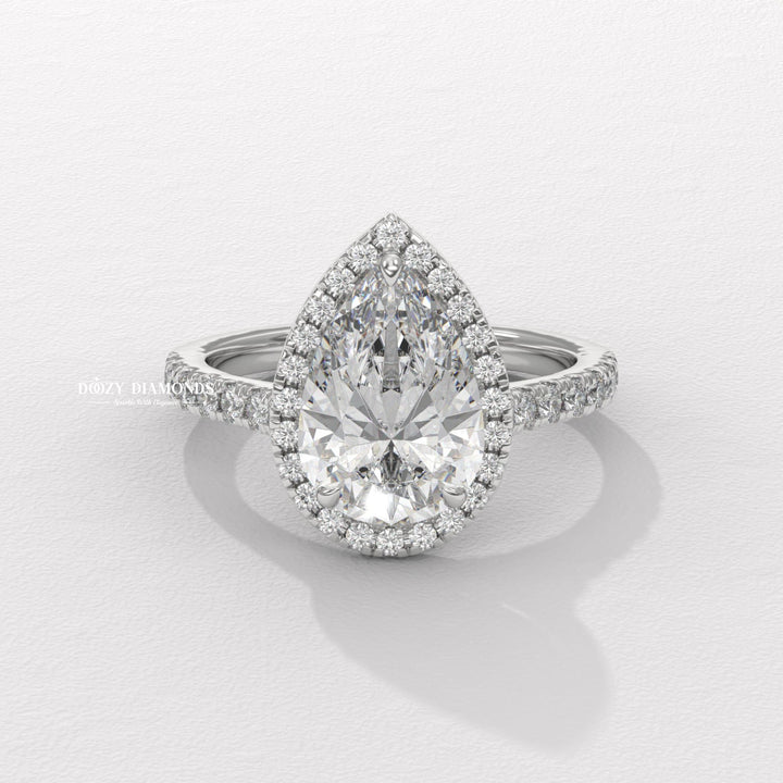 Pear cut engagement ring side view showing band detail