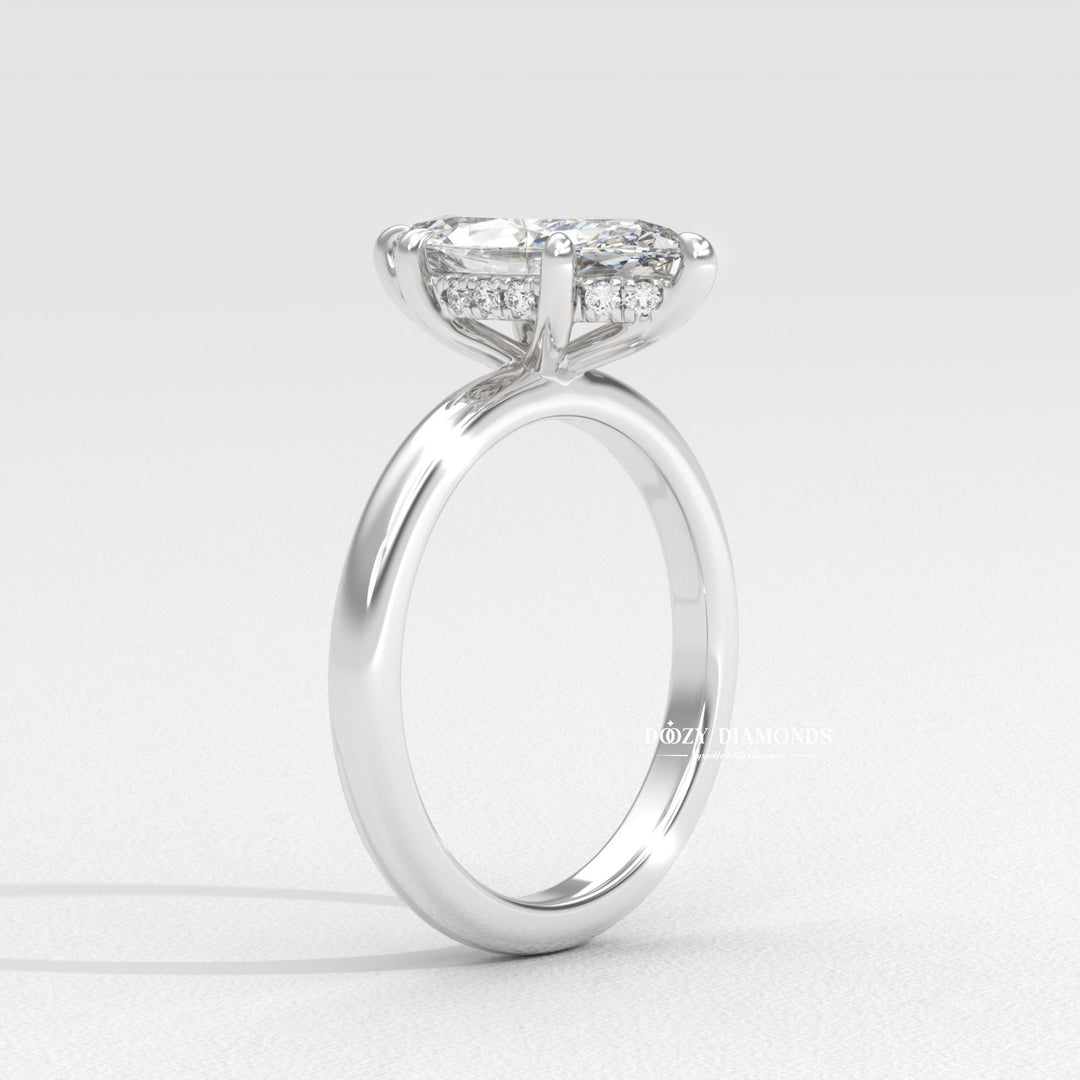 Marquise hidden halo ring set with an IGI graded diamond