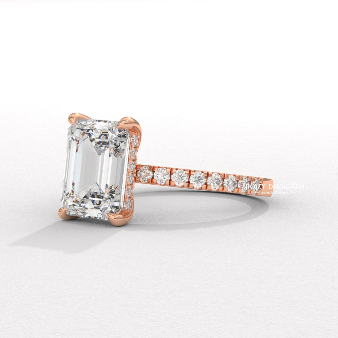 Emerald hidden halo lab grown diamond ring fitted on finger