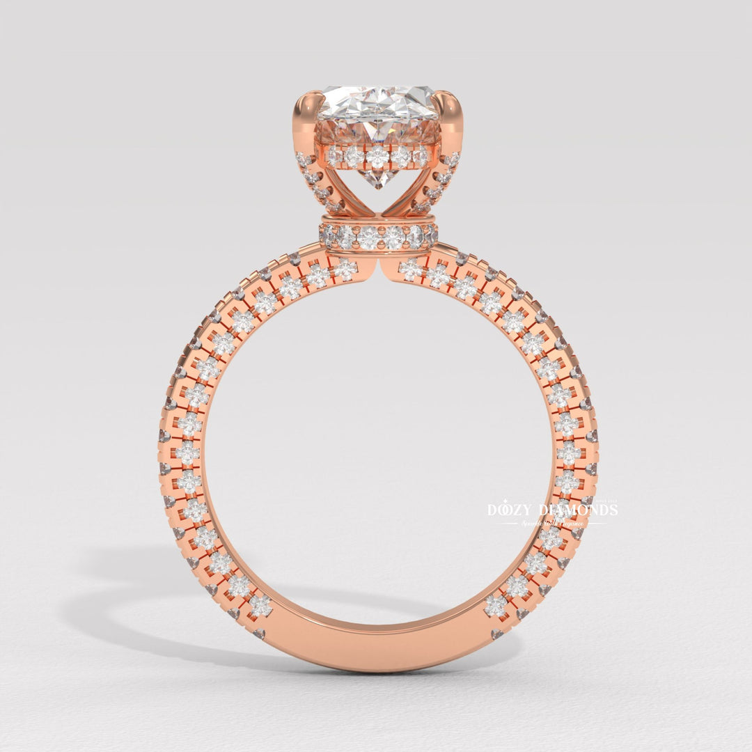 Oval cut diamond ring worn on hand