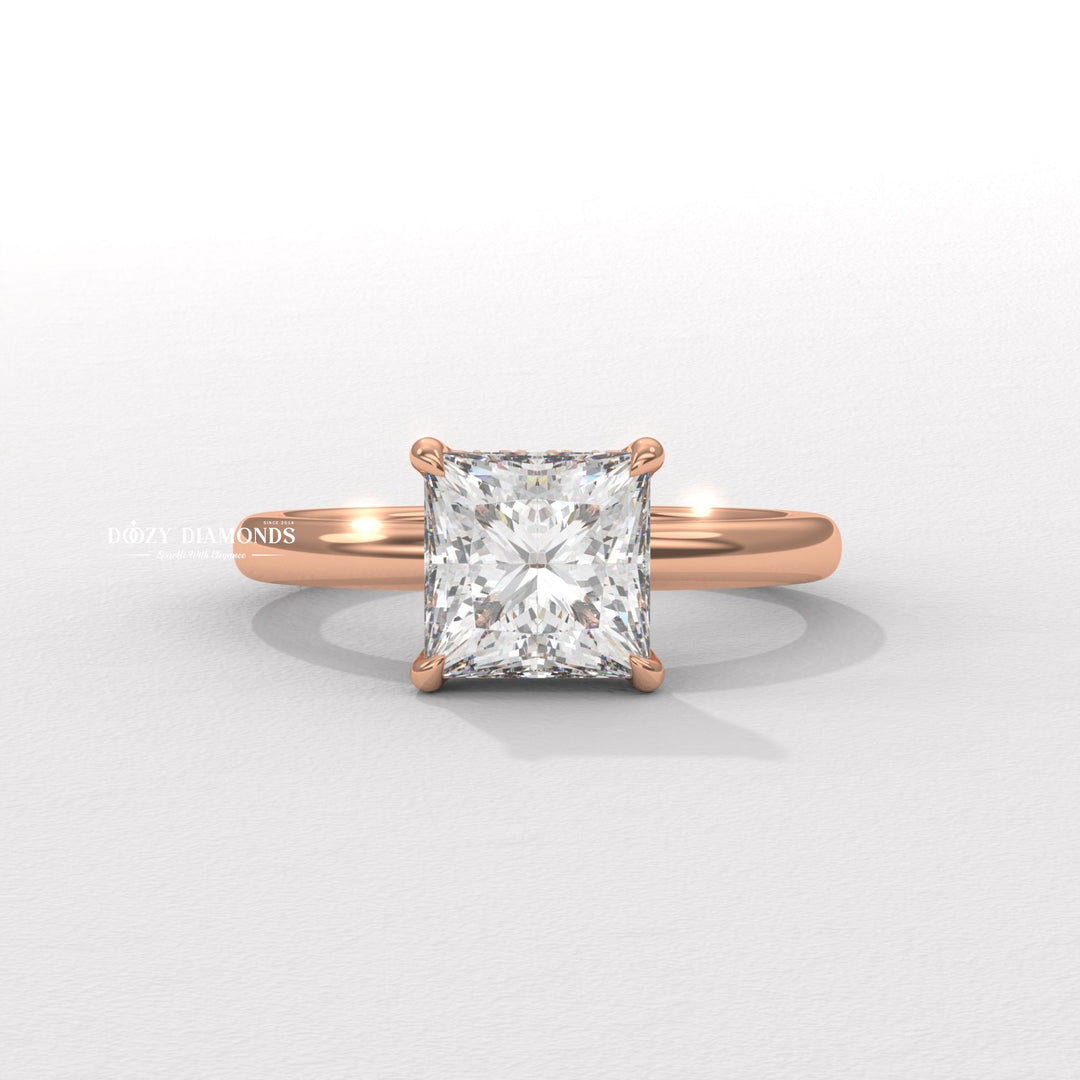 Lifestyle shot of princess solitaire diamond ring on hand