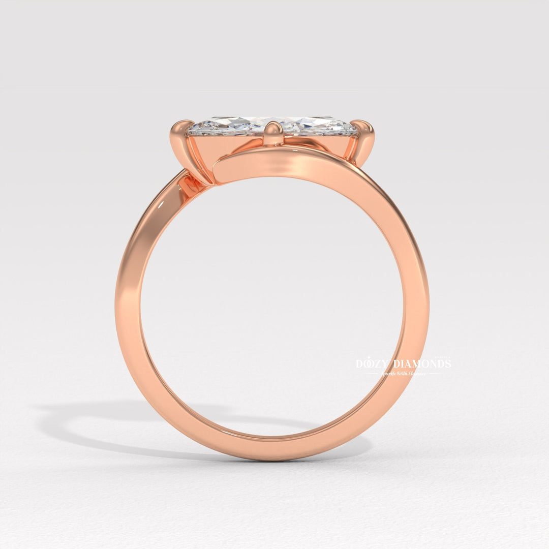Marquise cut engagement ring side view showing band detail