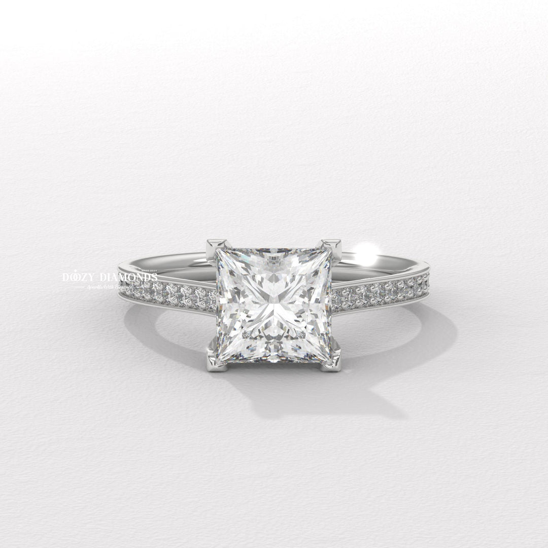 Detailed close-up of princess solitaire diamond engagement ring