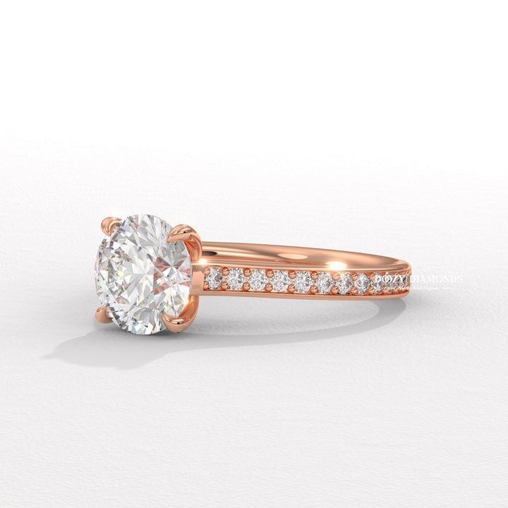 Top-down view of round cut pave engagement ring