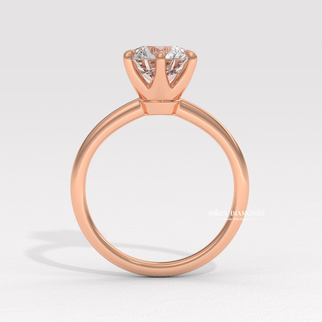 Side angle of round solitaire diamond engagement ring