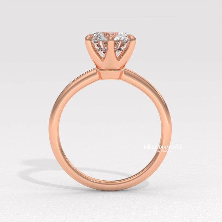 Side angle of round solitaire diamond engagement ring