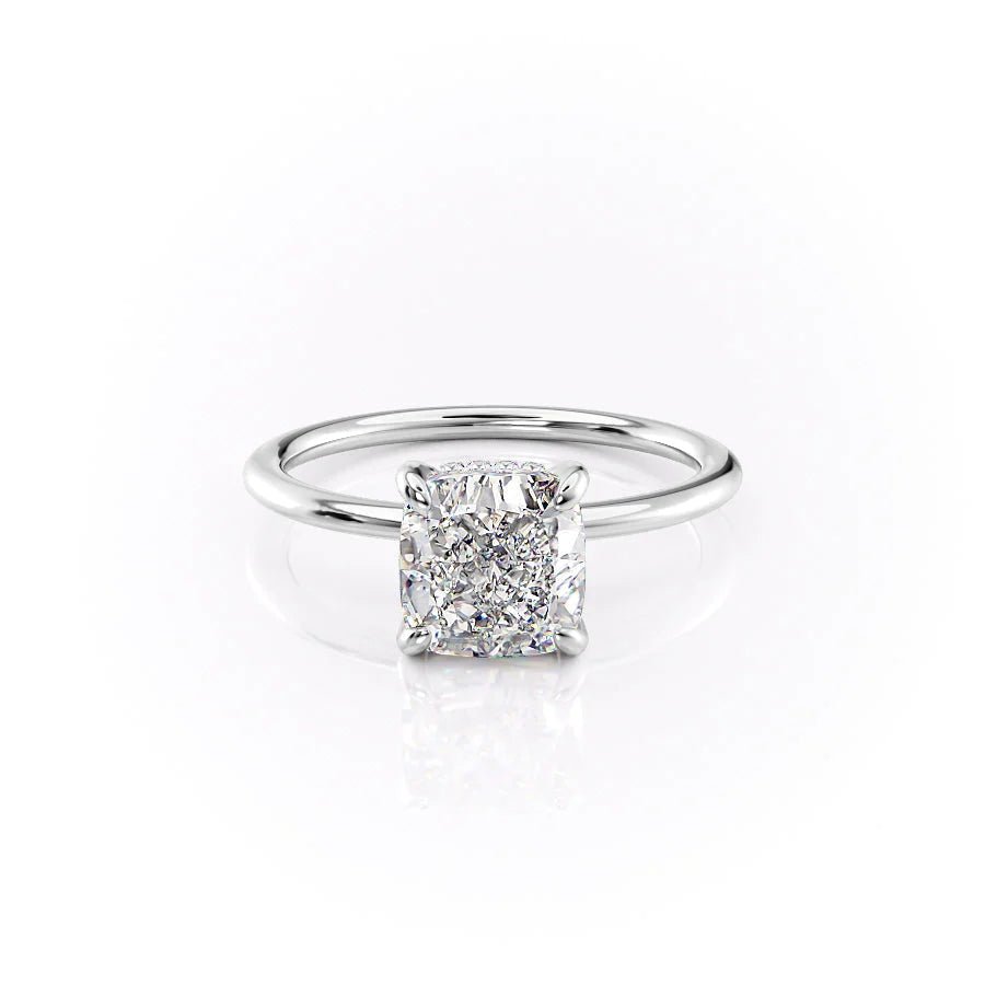 Cushion hidden halo engagement ring photographed in natural light