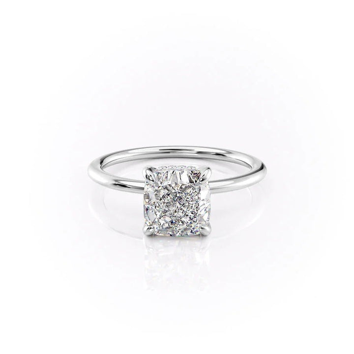 Cushion hidden halo engagement ring photographed in natural light