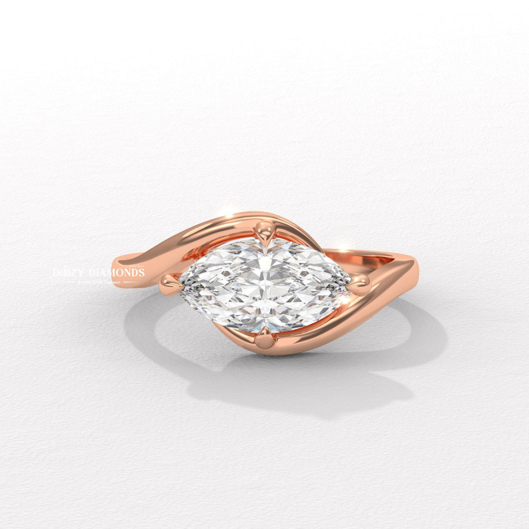 Detailed close-up of marquise east west diamond engagement ring
