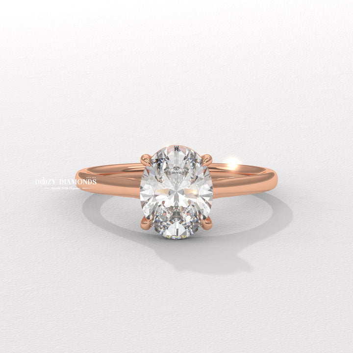 Oval cut solitaire engagement ring with IGI certified center diamond