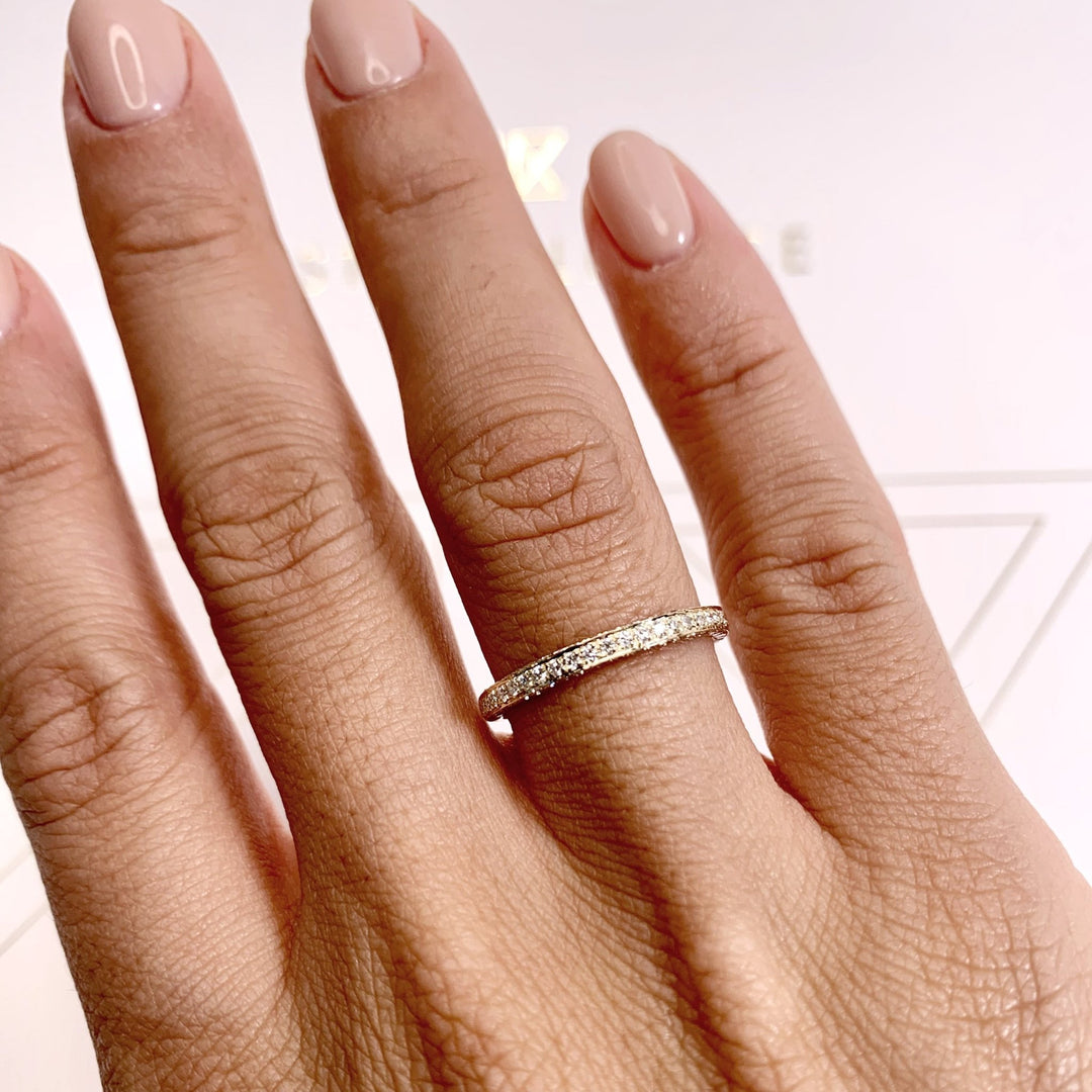 Round Brilliant diamond band stacked with engagement ring