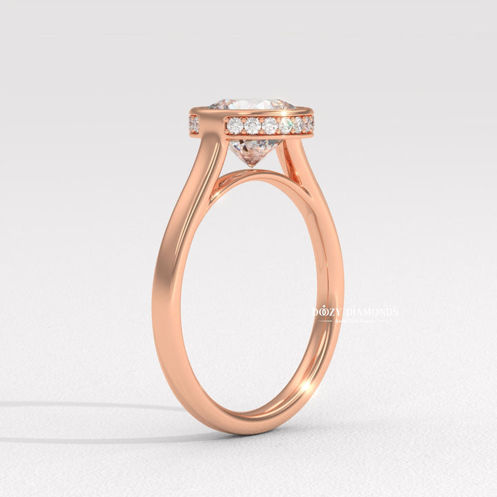 Round hidden halo diamond ring presented in signature gift packaging