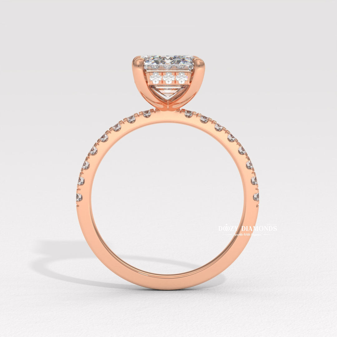 Emerald cut diamond ring worn on hand