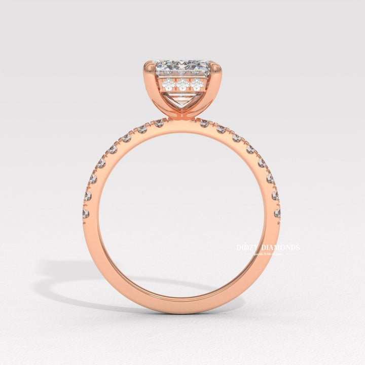 Emerald cut diamond ring worn on hand