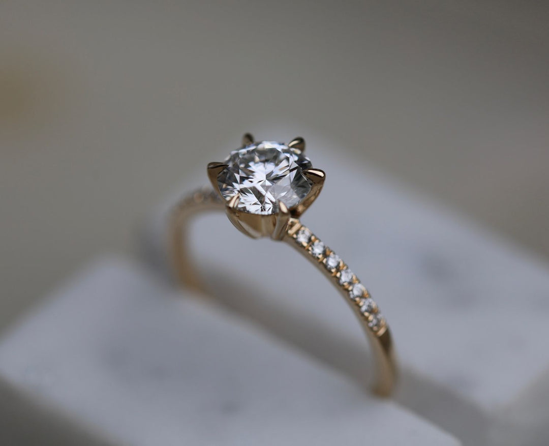Premium round cut solitaire engagement ring crafted in solid gold