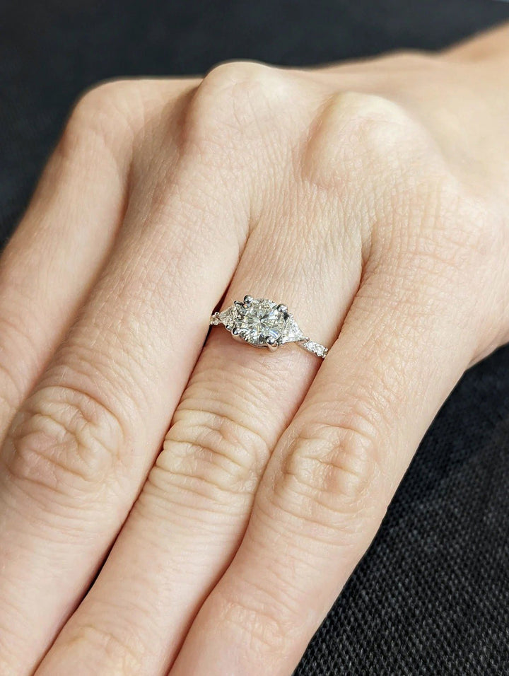 Macro shot of round cut diamond facets in pave ring setting