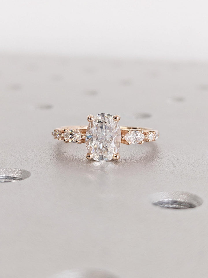 1.0CT oval cut cluster engagement ring available to buy now