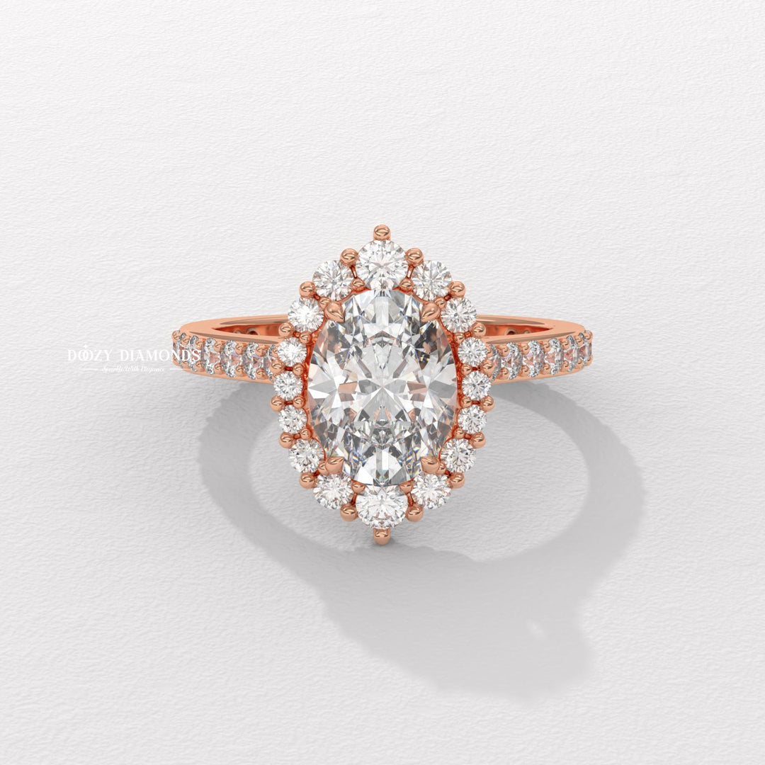 Oval cut diamond ring worn on hand